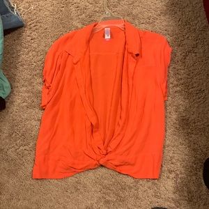 Coral colored button up short sleeve shirt. Size XL